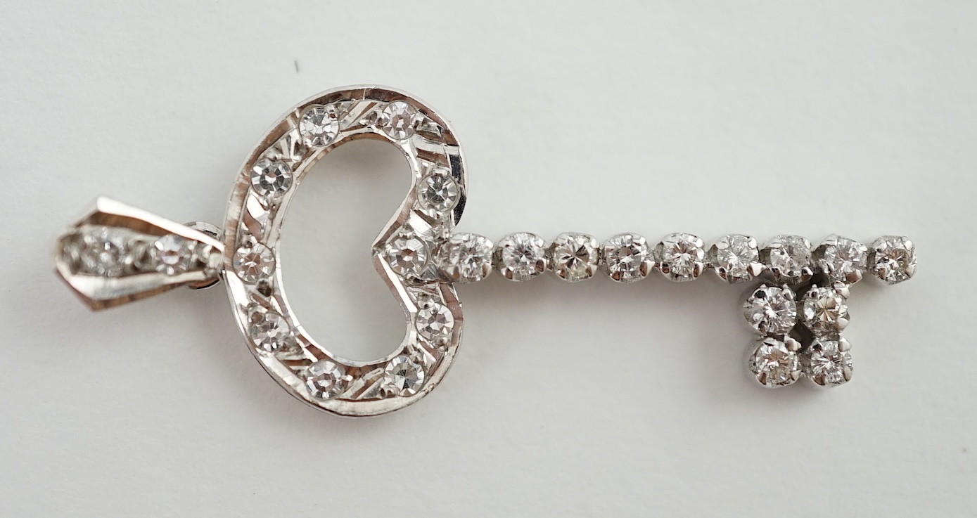 A mid 20th century Egyptian white gold and diamond cluster set 'key of the door' pendant